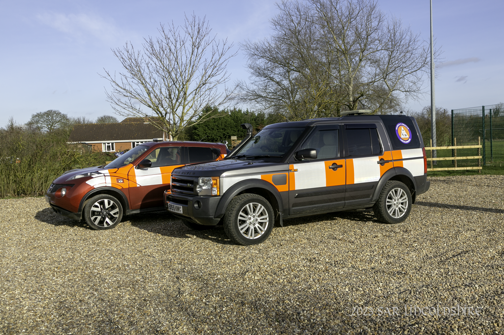 Search and Rescue 4 wheel drive landrover and car in livery